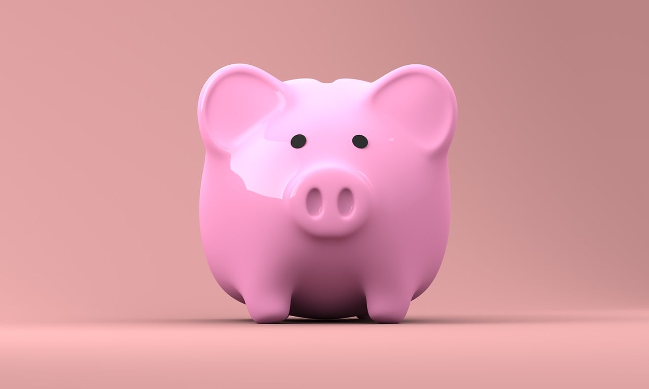 Image d'une tirelire en forme de cochon rose
